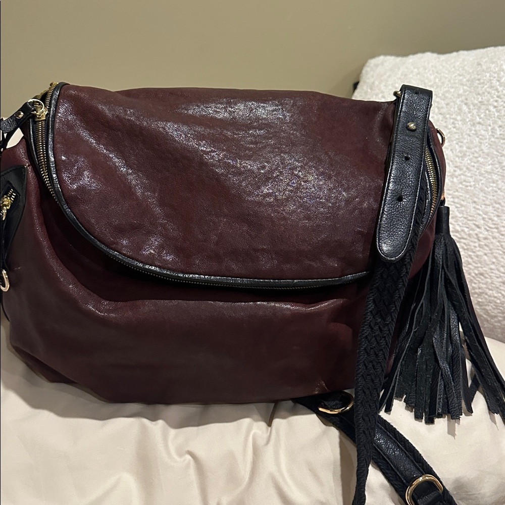 Kempton and Co saddle bag satchel lambskin bag Like new Color is a Burgundy